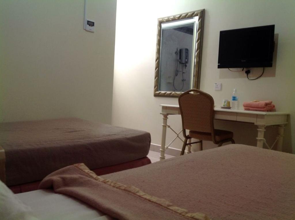 Hotel Morning Glory Kudat Quarto foto